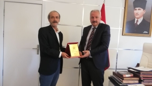 YEŞİLDER'DEN  Battalgazi Kaymakamı Duran'a plaket