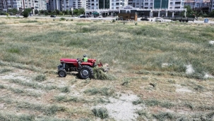yeşilyurt belediyesi yangın riskine karşı ot biçme çalışmalarını hızlandırdı
